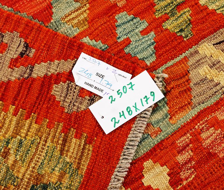 A Kilim carpet, c. 248 x 179 cm.