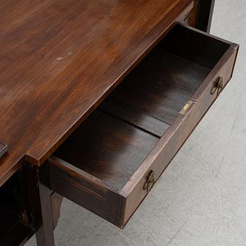 A mahogany-veneered sideboard, England, around 1900.