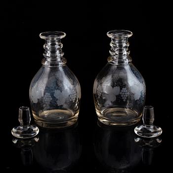 A pair of mid 19th century glass decanters and stoppers.