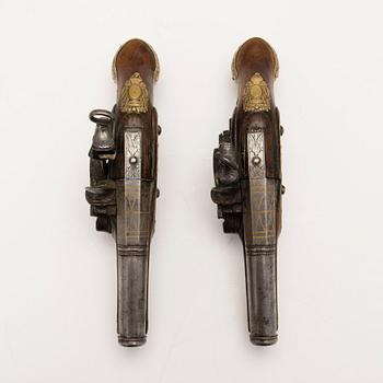 Pair of Spanish miquelet flintlock pocket pistols, second half of 18th Century.