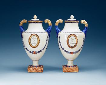 1474. A pair of famille rose vases with covers, Qing dynasty, Qianlong (1736-95).