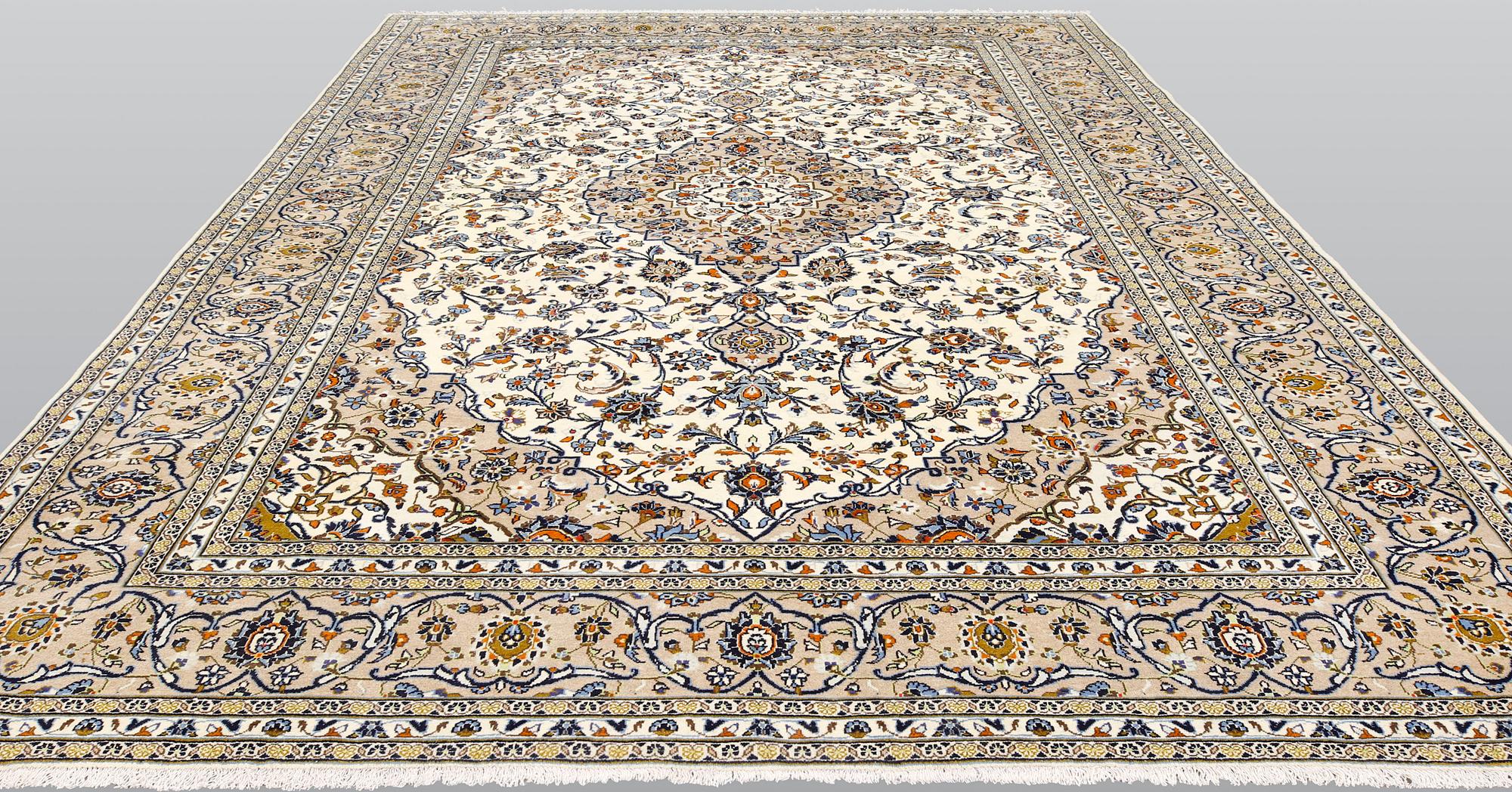 A Keshan carpet, approx. 390 x 295 cm.