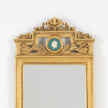 A Gustavian style mirror, mid 20th Century.