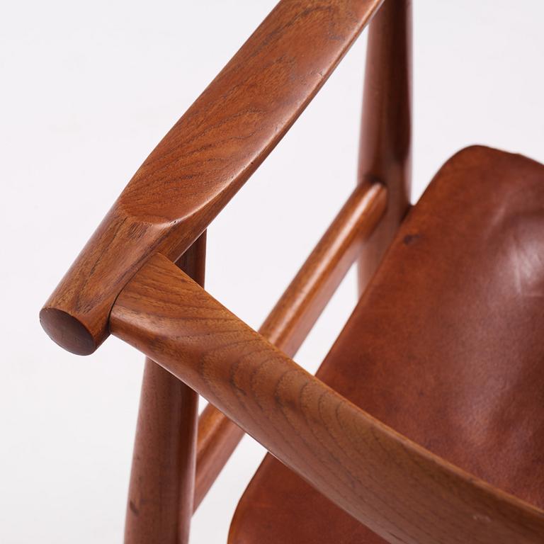 Hans J Wegner, a teak and brown leather 'CH-35', Carl Hansen & Son, Denmark 1950-60s.