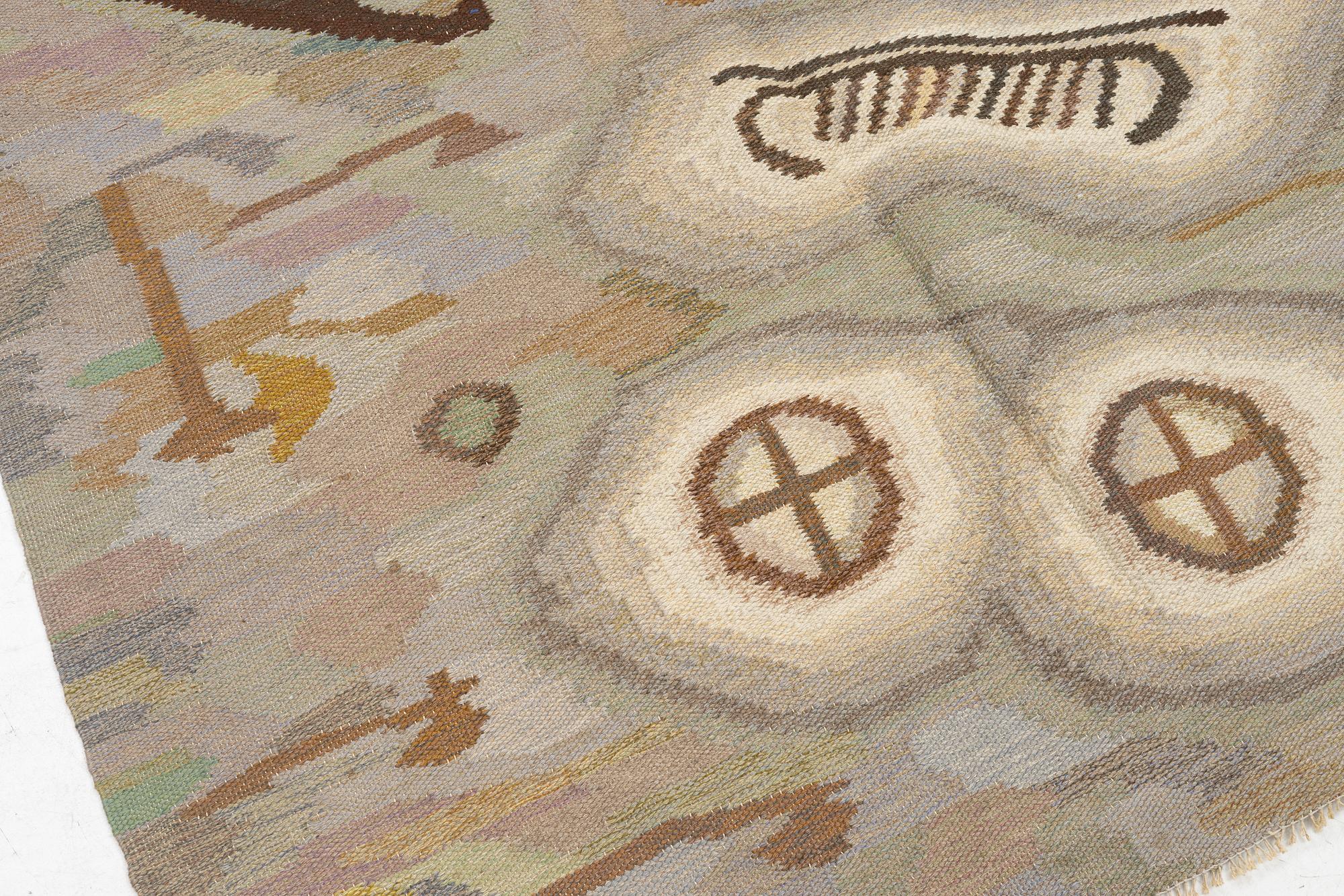 Edvin & Magnhild Lundsten, a carpet, 'Hällristningar' ('Petroglyph'), flat weave, c. 280 x 192 signed EML.