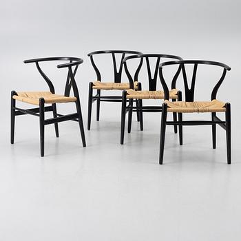 Hans J. Wegner, four CH24 / "Wishbone" chairs, Carl Hansen & Son, Denmark, second half of the 20th century.
