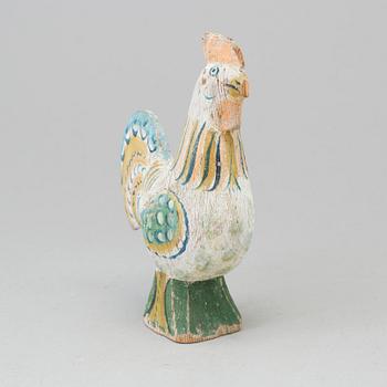 A painted wooden cockerel, 19th/20th century.