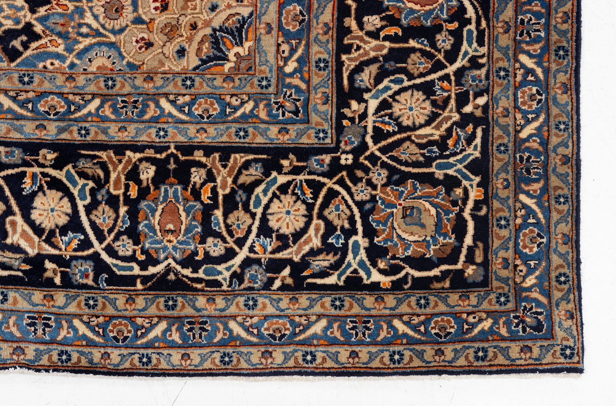 A Keshan rug, approx. 370 x 297 cm.