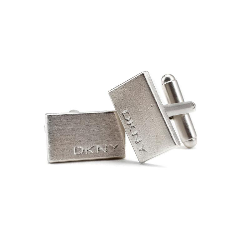 DKNY, a pair of cufflinks.