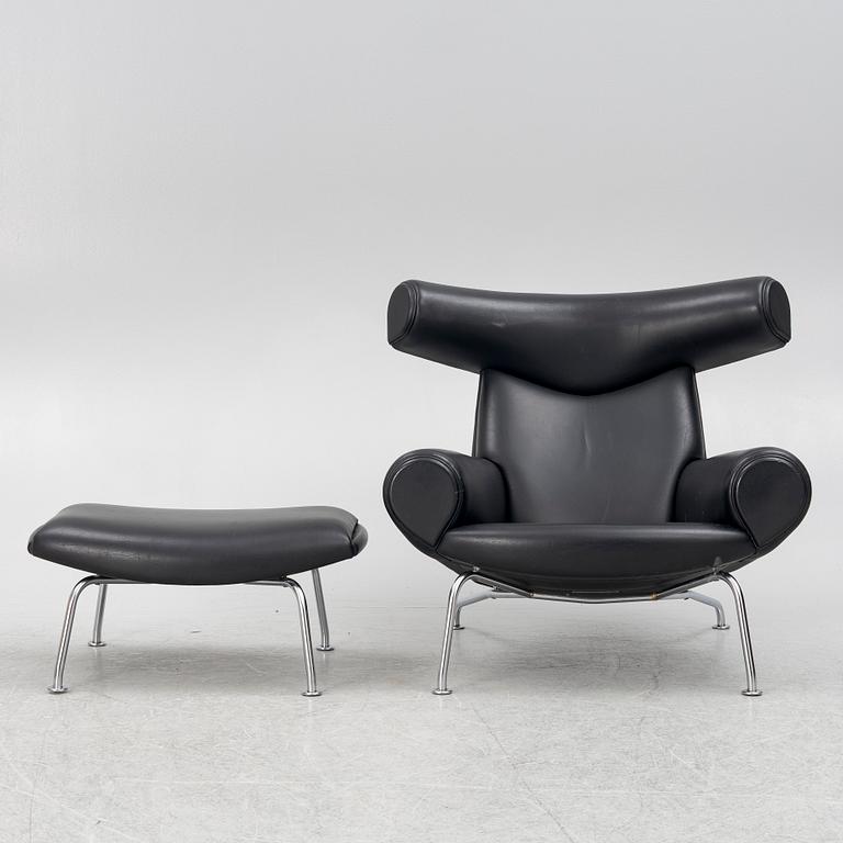 Hans J. Wegner, fåtölj med fotpall, "Ox Chair", EJ-100, Erik Jørgensen Møbelfabrik A/S, Svendborg, Danmark.