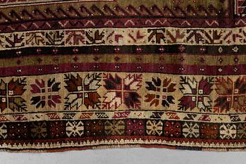 A carpet, antique Avanos, ca 190 x 136 cm (as well as 5 and 6 cm of flat weave on each end.).