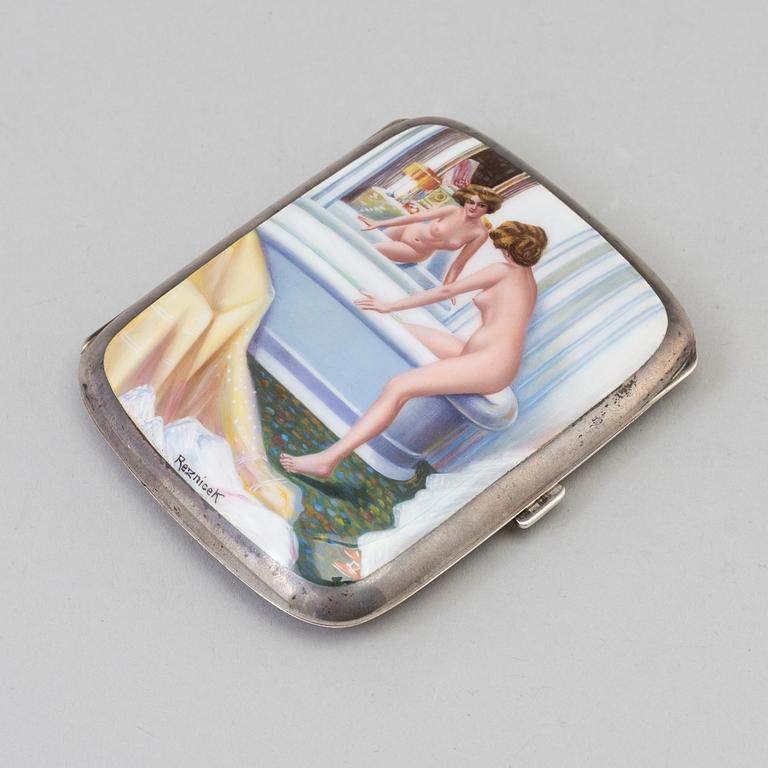 A 935/1000 silver and enamel cigarette case, with signature 'RezniceK'.