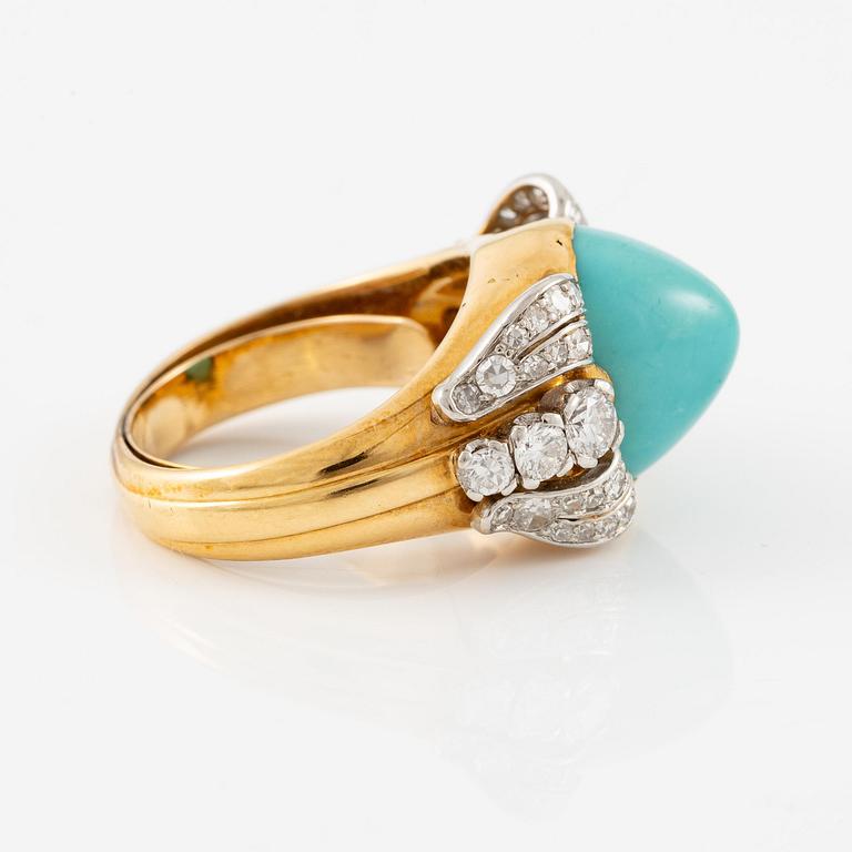 A W.A. Bolin ring in 18K gold with a turquoise and round brilliant- and eight-cut diamonds.
