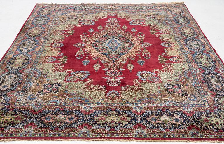 A carpet, Kerman, c. 370 x 275 cm.