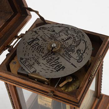 A mantle clock with a polyphon music box, around 1900.