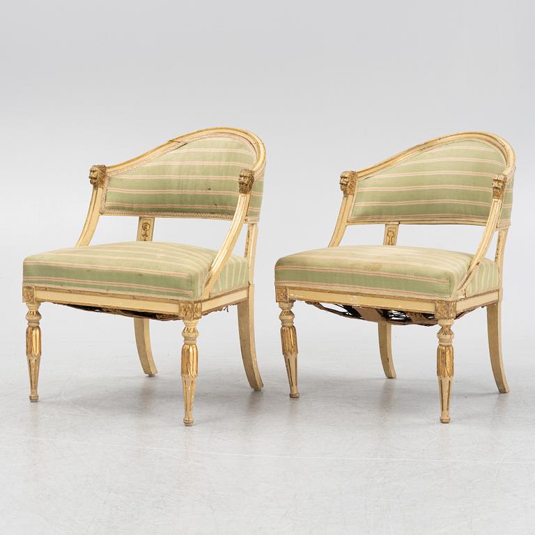 A matched pair of Gustavian style armchairs. One from around the year 1800 and one from around the year 1900.