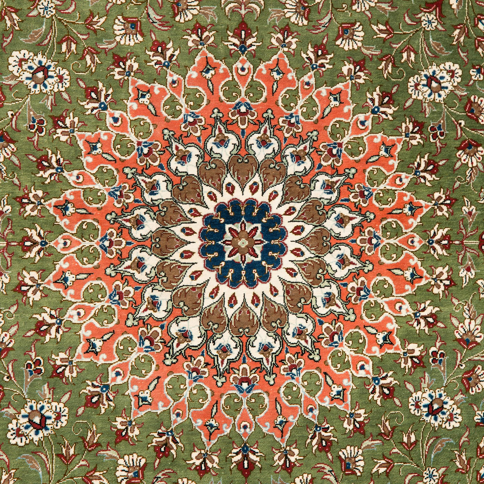 A silk Qum rug, circa 152 x 101 cm.