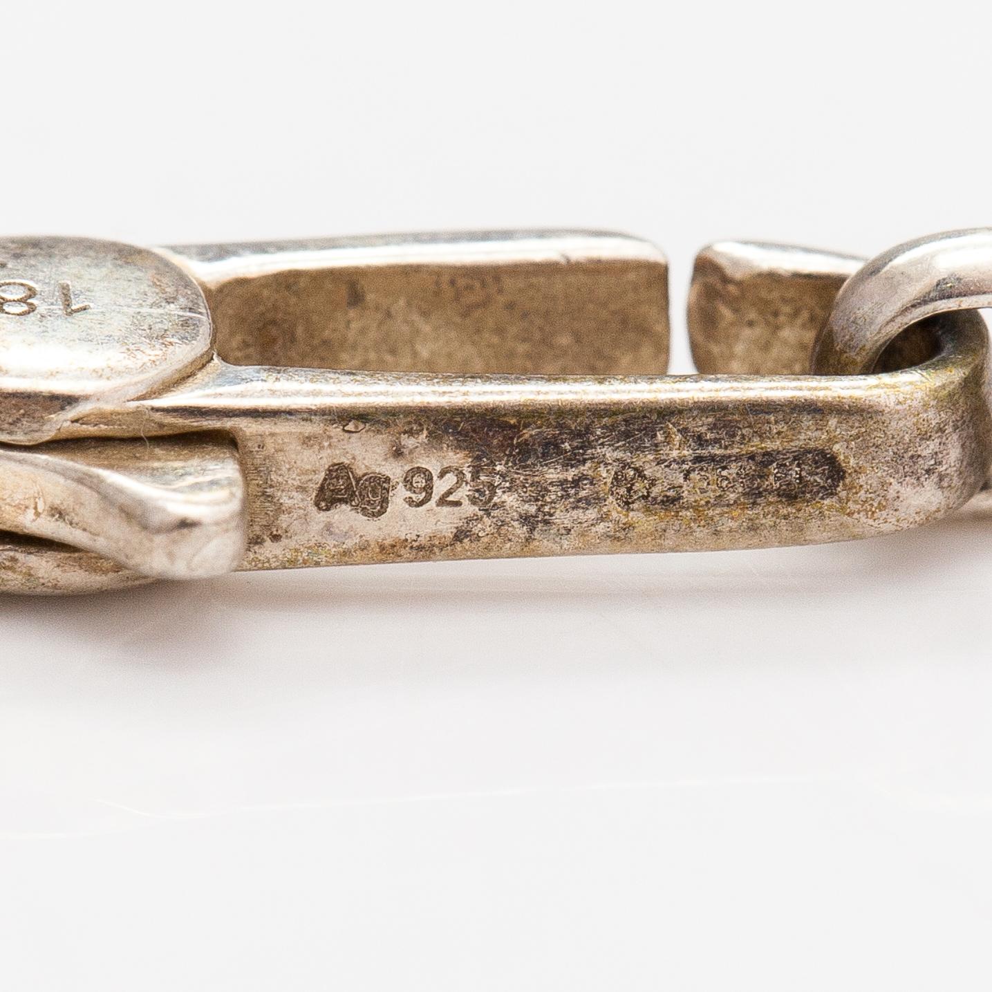 Gucci, A pair of earrings, bracelet, ring and necklace made of sterling silver. Marked Gucci, Made in Italy.