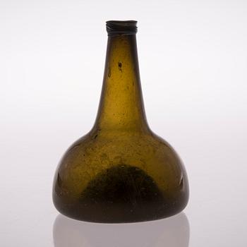 An 18th century glass  bottle.