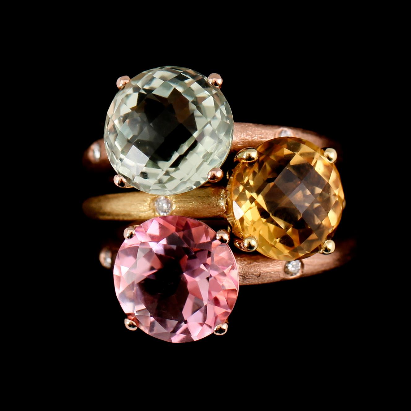 RINGAR, 3 st, 18 k matterat gult och roséguld, brioletteslipad topas, ametist och citrin samt briljantslipade diamanter.