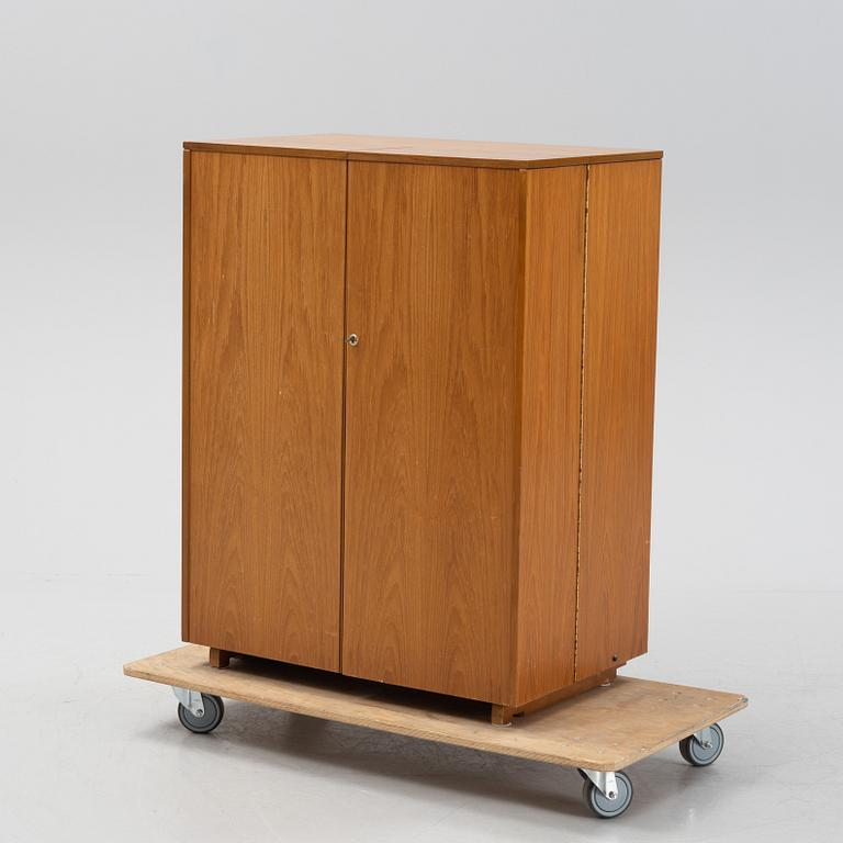 A teak veneered 'Home Office', Newcraft Ltd, England, second half of the 20th Century.