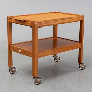 A 1930s/1940s elm veneered trolley.