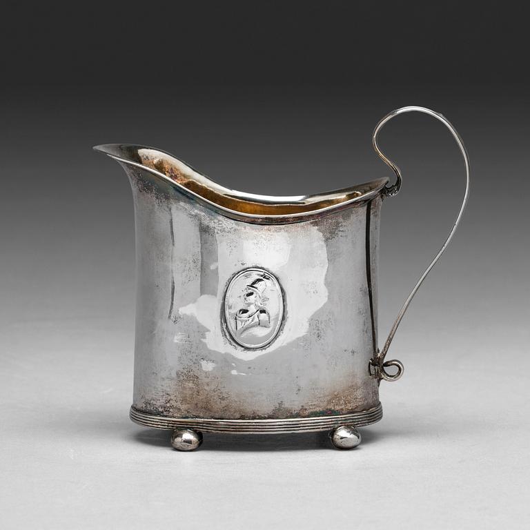 A Swedish early 19th century parcel-gilt milk-jug, mark of HI Lyberg, Borås 1820.