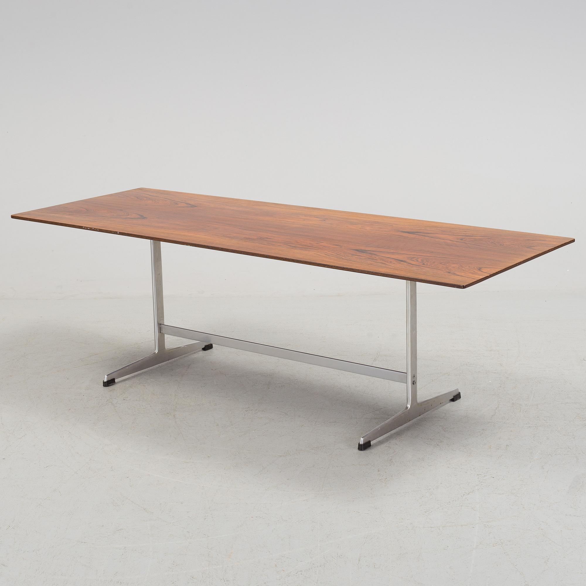 A rosewood top and aluminium coffee table, model 3315 by Fritz Hansen, Denmark 1968.