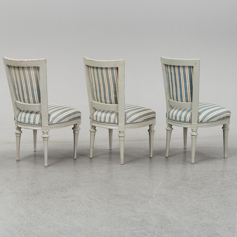 Six (3+2+1) late 18th century Gustavian chairs.
