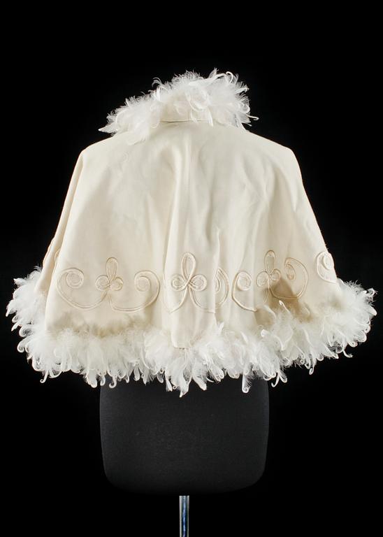 A cream colored silk wedding dress/evening dress by Mea.