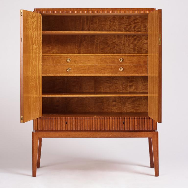 Erik Mattsson, "Stockholm 1", a cabinet, ed. 12/12, executed by Birger Ekman, Mjölby Intarsia for AB Harry Carlsson Stockholm, 1944.