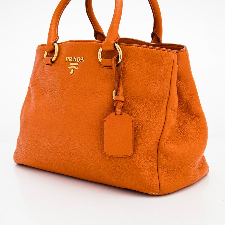 Prada, a 'Vitello Daino Tote' bag.