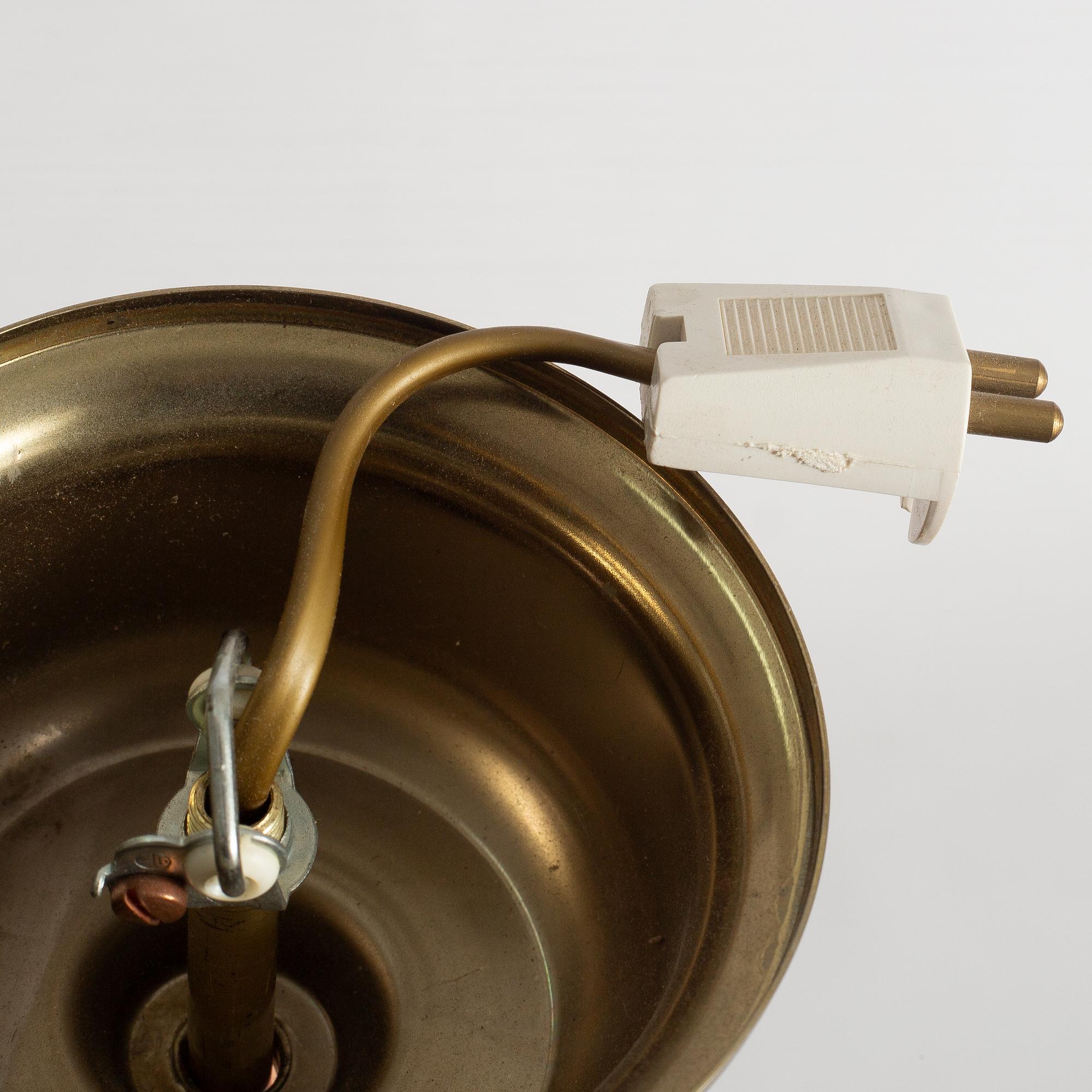 Saturnuslampa, 1900-tal.