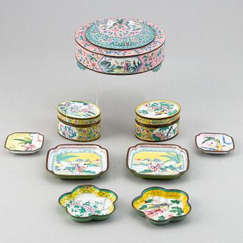 A set of tree chinese boxes with cover, and 6 dishes, enamel on copper, China, early 20th Century.