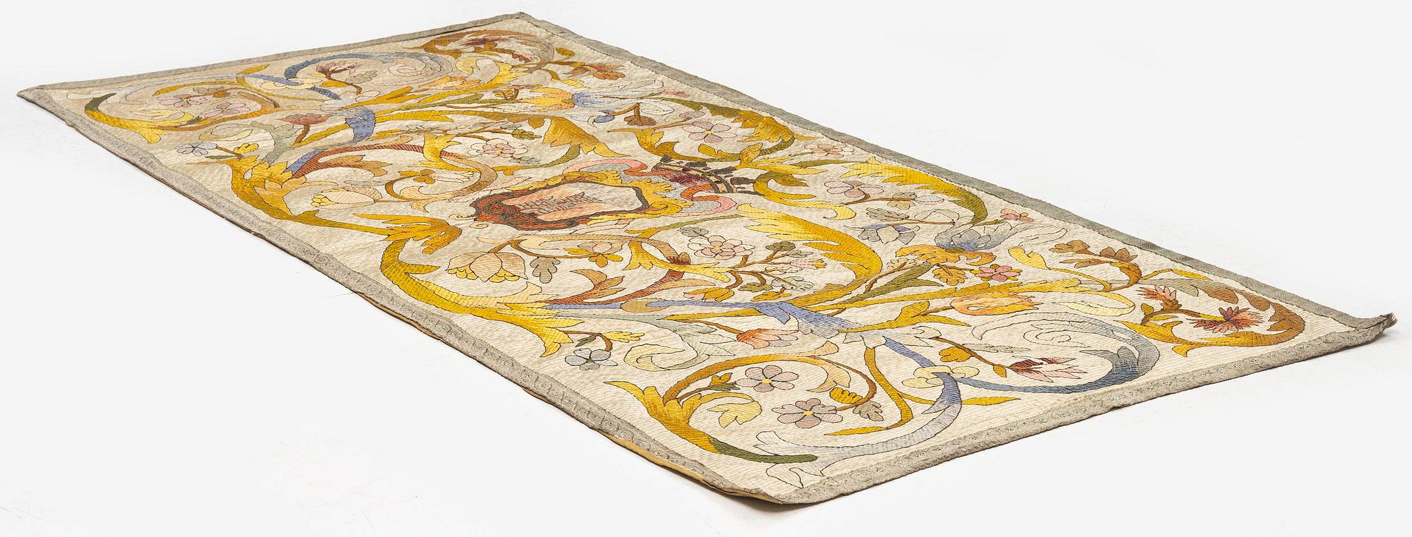 An antique silk embroidery, c. 187 x 88, around the year 1900.