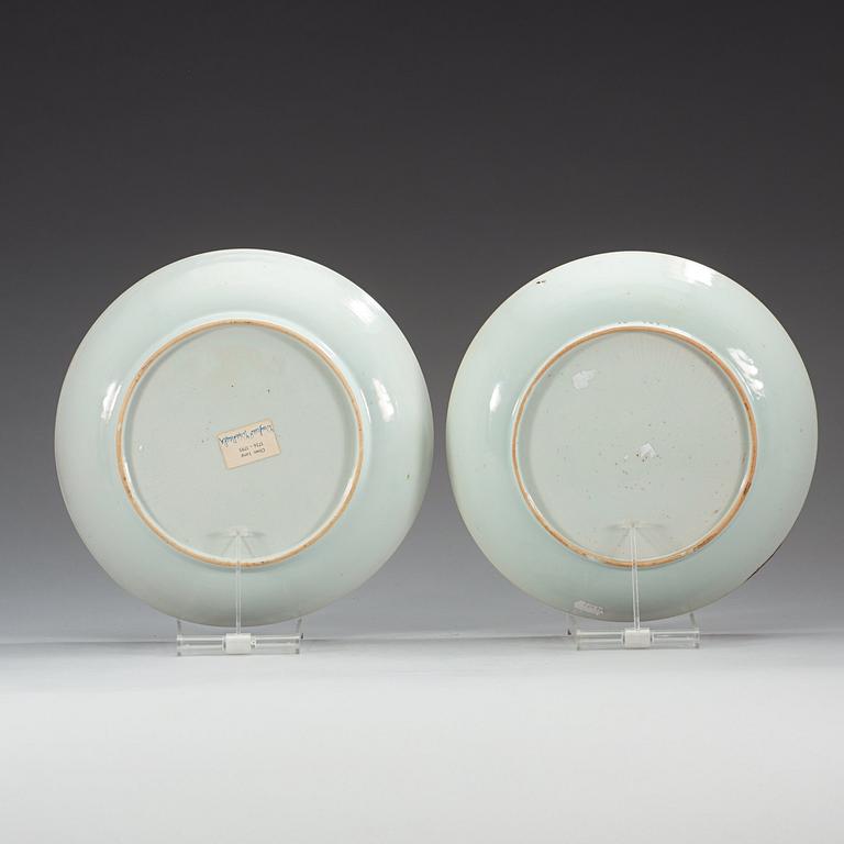 A pair of famille rose 'double peacock' dishes, Qing dynasty, Qianlong (1736-95).