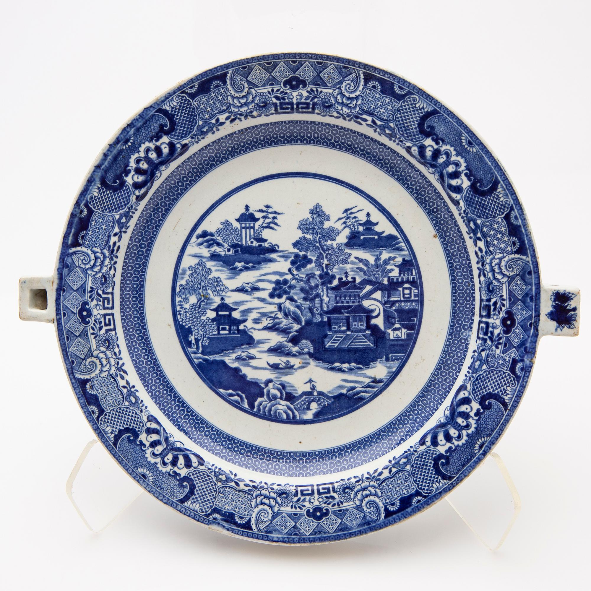 Hot watert plates, two pieces, creamware, Europe 19th century.