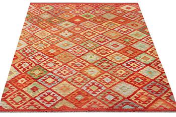 A Kilim carpet, c. 307 x 202 cm.