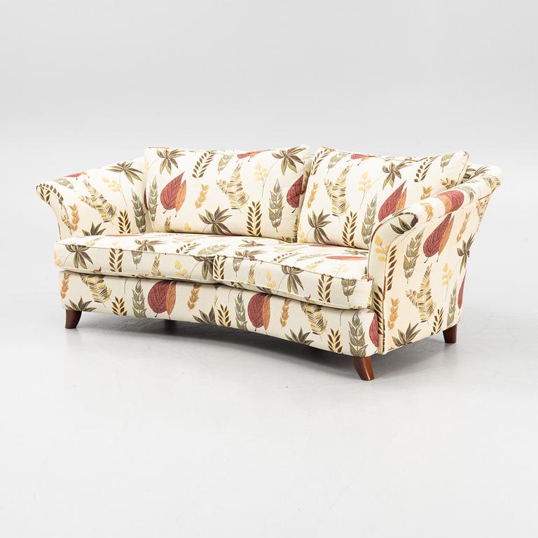 A curved sofa from Bröderna Andersson.