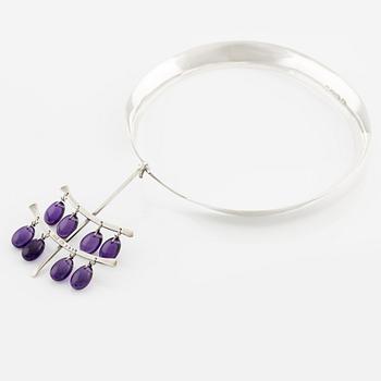 Vivianna Torun Bülow-Hübe, a necklace with a pendant, No. 160 and No. 35, sterling silver  with amethyst, for Georg Jensen, Copenhagen.
