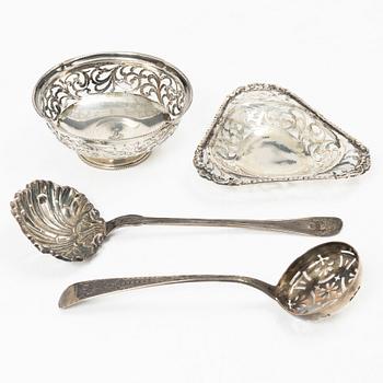 Two pierced silver bowls and two sugar spoons, including Sweden and Endland, 20th century.