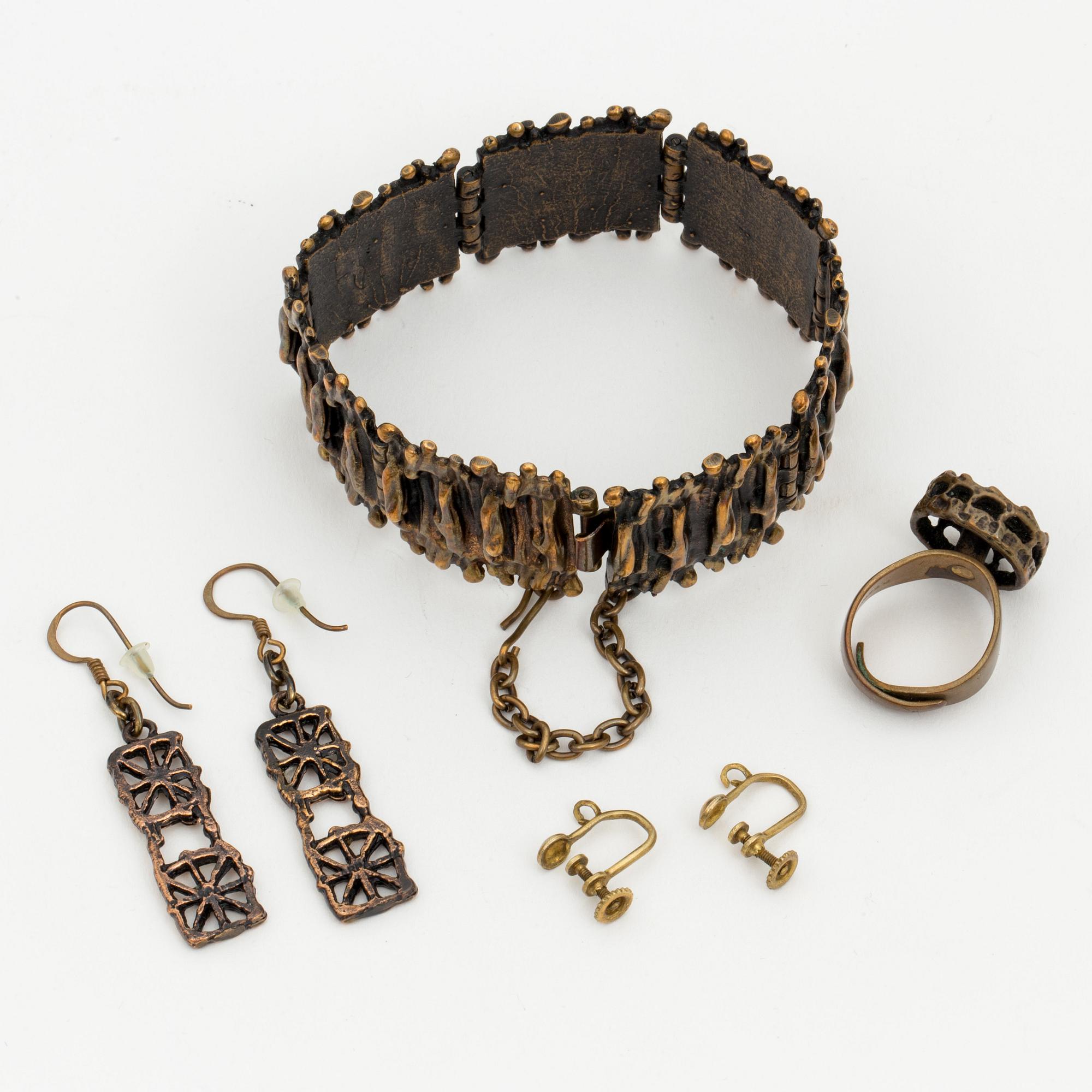 A bronze bracelet, ring and a pair of earrings by Pentti Sarpaneva, Finland.