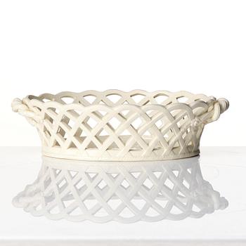 A latticed creamware chestnut basket with stand, 19th century.