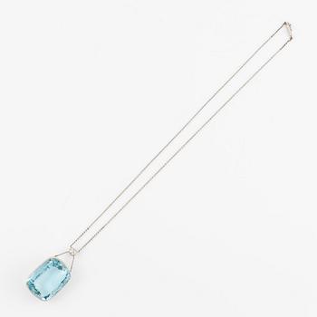 A platinum necklace with a faceted aquamarine and an oval old-cut diamond.