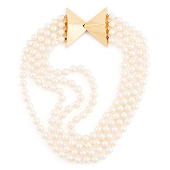 516. Kristian Nilsson, a four strand cultured pearl necklace with an 18K gold clasp, , Stockholm 1985.