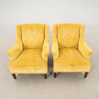 Armchairs a pair of "Cosy" Nordiska Kompaniet (NK) later part of the 20th century.