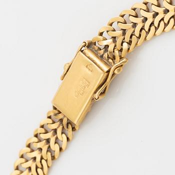 Armlänk, 18K guld.