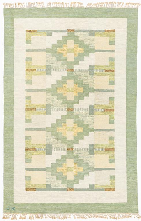 A flat weave carpet, signed JK, ca 310 x 200 cm.