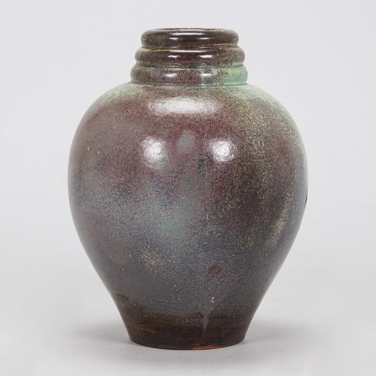 Heidi Blomstedt, a red clay floor vase, signed and dated -36.