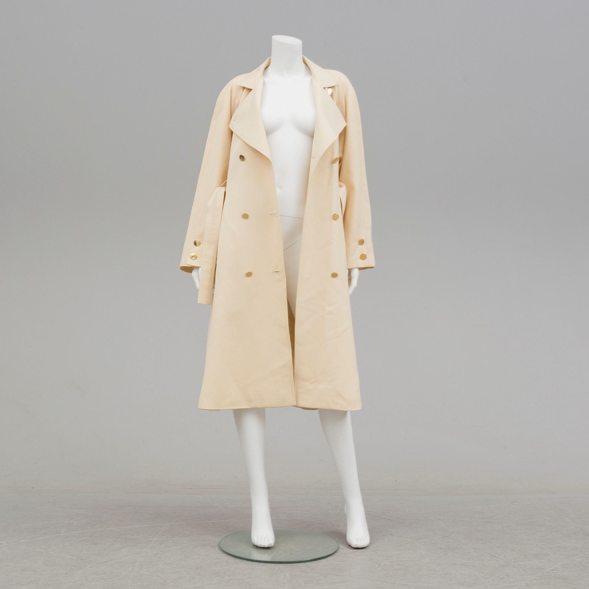 A trench-coat by Guy Laroche.